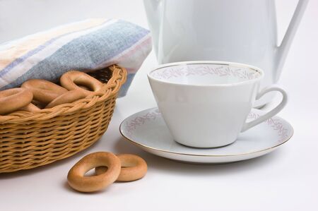 tea set and bagels on a plateの写真素材