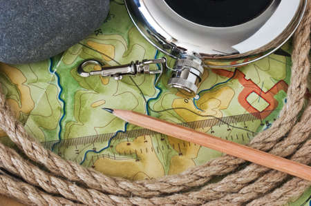topographic maps and flask whiskeyの写真素材