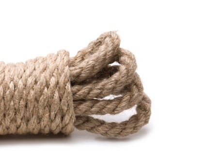 coil of hemp rope isolated on a white background