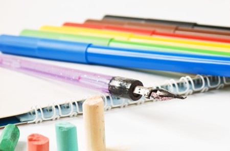 pastel crayons and watercolors to paint