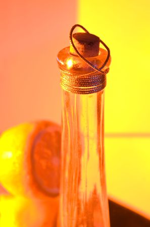 bottle and lemon multicolored lightsの写真素材