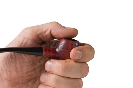 tobacco pipe  in hand isolated on white backgroundの写真素材