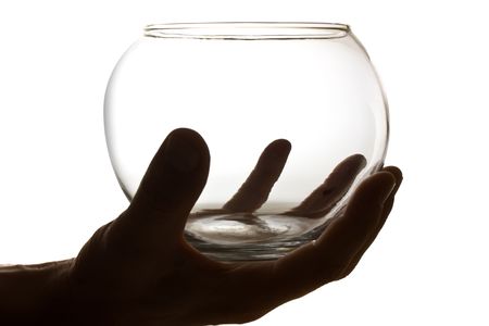 hand holding an empty glass container isolatedの写真素材