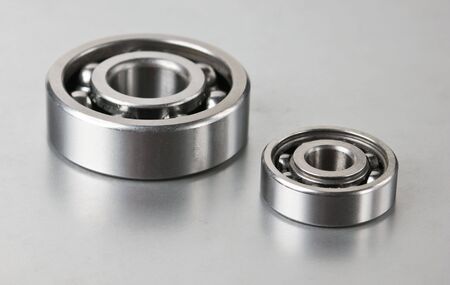 two bearings on the gray metal tableの写真素材