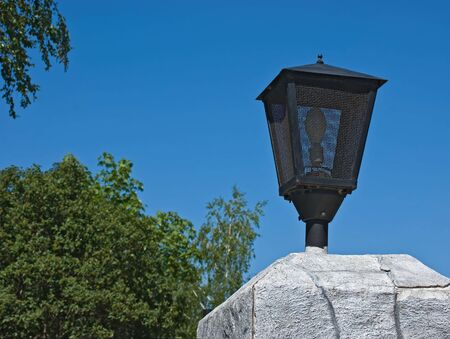 street lamp on the stone pillarの写真素材