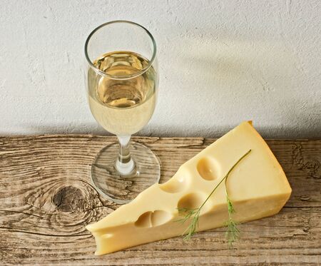 glass of wine and cheeseの写真素材