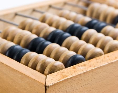old wooden abacus  isolated on a white backgroundの写真素材