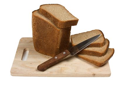 sliced rye bread and knife  isolated on white backgroundの写真素材