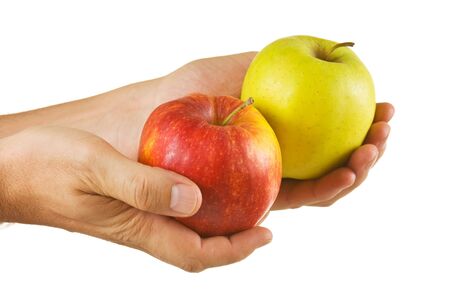 two apples in the hands isolated on white backgroundの写真素材