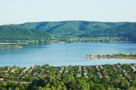 Tranquil rural scenery with houseの写真素材
