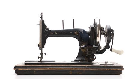 Old sewing machine  isolated on a white background
