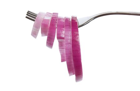 onions on a fork isolated on white backgroundの写真素材