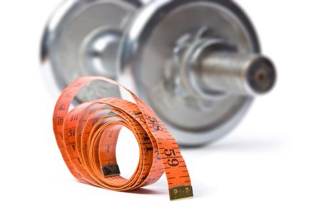 dumbbell and measuring tape. isolated on white の写真素材