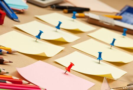 Many reminder notes on the pasteboard background 
