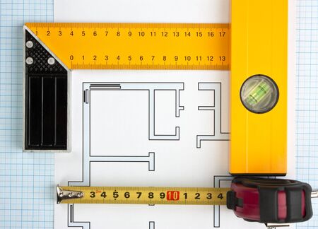 development drawings and tools on graph paper