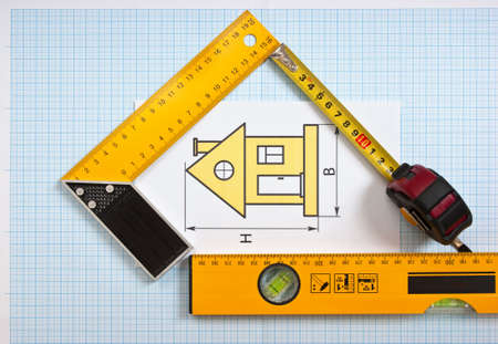 construction drawings and tools on graph paperの写真素材