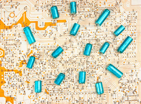 Old electronic components lie on the wiring diagramの写真素材