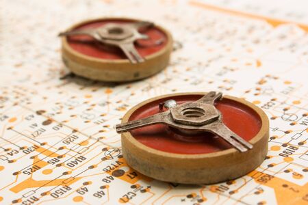 Old electronic components lie on the wiring diagramの写真素材