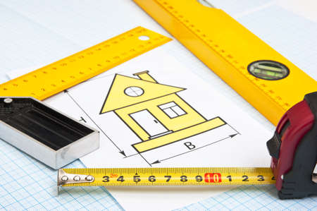 construction drawings and tools on graph paperの写真素材