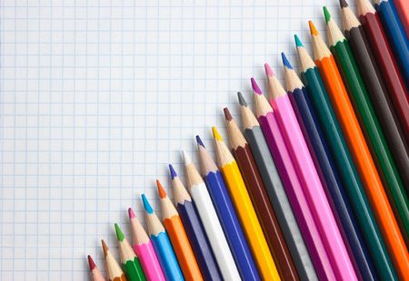 colored pencils at school notebookの写真素材