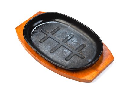 cast-iron pan isolated on white backgroundの写真素材
