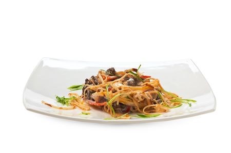 dishes of roast meat with vegetables and spices  isolated on white backgroundの写真素材