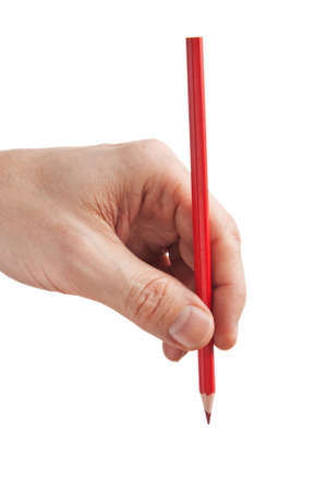 red pencil in hand  isolated on white backgroundの写真素材