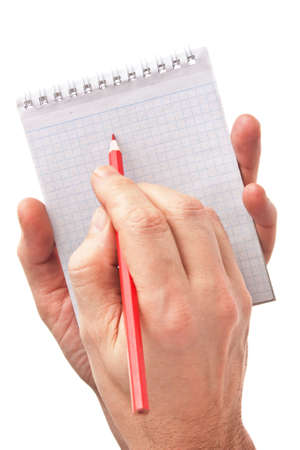 red pencil in hand  isolated on white backgroundの写真素材