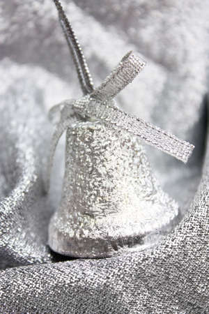 Christmas silver bell  on Christmas background の写真素材