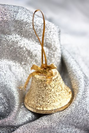 Christmas gold bell  on Christmas background の写真素材