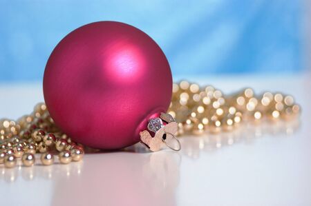 Christmas ball and gold beadsの写真素材