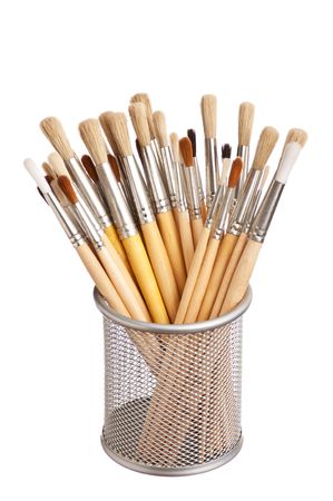 brush to paint in the basket  isolated on a white backgroundの写真素材