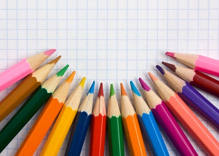 colored pencils at school notebookの写真素材