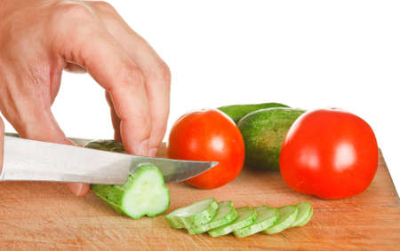 chop tomatoes and cucumbers  isolated  on white backgroundの写真素材