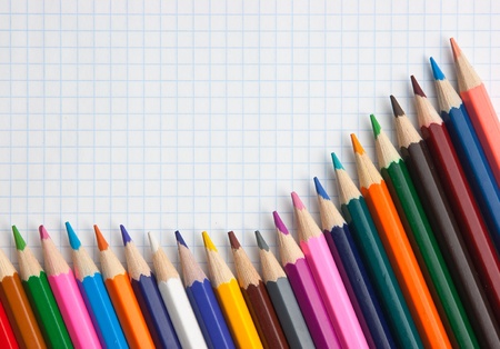 colored pencils at school notebookの写真素材