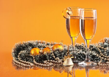 two glasses of wine and Christmas decorationの写真素材