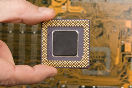 computer processor in the handの写真素材