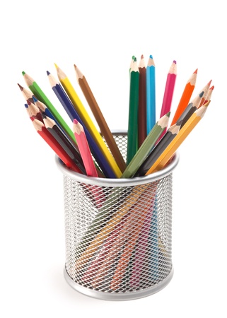 colored pencils in basket isolated on a white  backgroundの写真素材