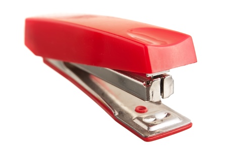 red stapler isolated on white backgroundの写真素材