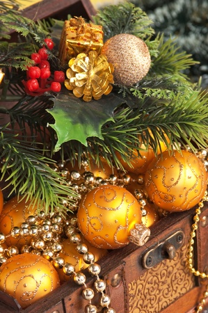 Christmas decoration in chest on Christmas background の写真素材