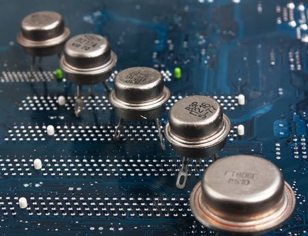 old silicon chip on the electronic boardの写真素材