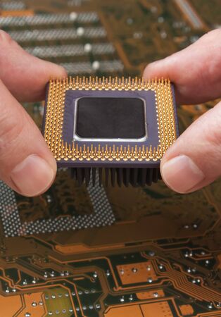 computer processor in the handの写真素材