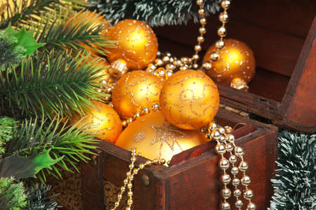 Christmas decoration in chest on Christmas background の写真素材