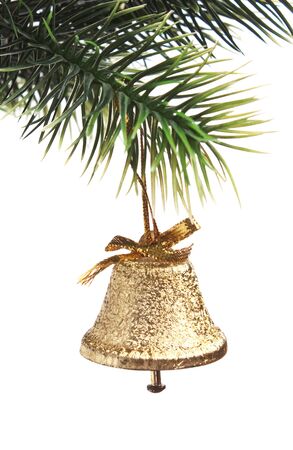 gold bell on the Christmas tree isolated on white backgroundの写真素材