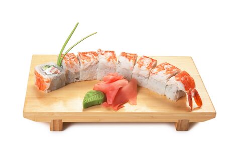Asian food sushi on wooden plate isolated on white backgroundの写真素材