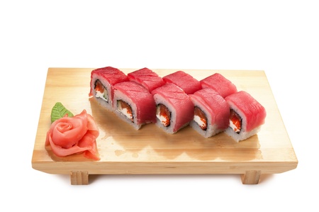 Asian food sushi on wooden plate isolated on white backgroundの写真素材