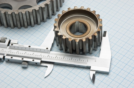 gears and caliper on graph paperの写真素材
