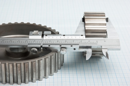 gears and caliper on graph paperの写真素材