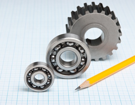 gears and bearings on graph paperの写真素材