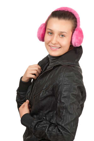 happy girl teen in pink headphones  isolated on whiteの写真素材